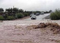 طغیان رودخانه باعث مسدود شدن محور ترانزیتی بنادر کنارک - جاسک شد طغیان رودخانه باعث مسدود شدن محور ترانزیتی بنادر کنارک - جاسک شد
