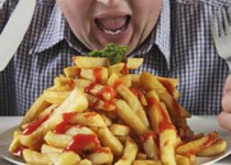 چرا وقتی استرس داریم پرخوری می‌کنیم