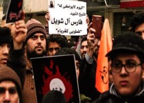 پشت پرده حمله به کنسولگری عربستان در مشهد چه بود؟/ بالا بردن تصویر سرکرده القاعده در میان جمعیت معترض به اعدام شیخ نمر!+ تصویر