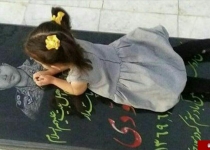 شهیدی که دختر سه ساله خود را در آغوش گرفت +عکس